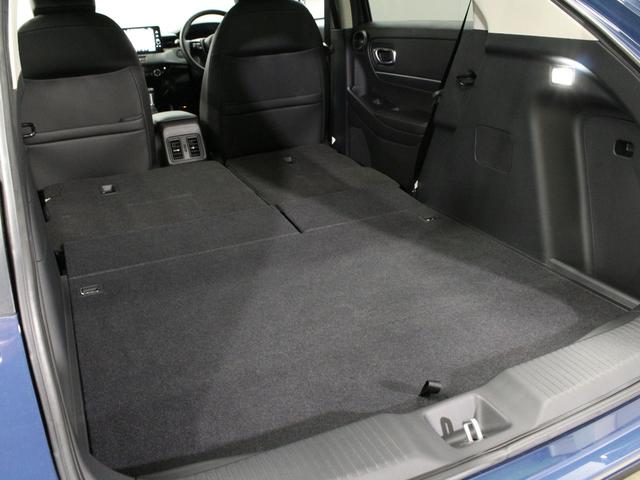 ヴェゼル ｅ：ＨＥＶＺ　弊社デモカー　プレミアムオーディオ　純正９インチコネクト対応ナビ　マルチビューカメラ　サイドカーテンエアバッグ　Ｂｌｕｅｔｏｏｔｈ　ワイヤレス充電器　パワーテールゲート　運転席助手席シートヒーター（34枚目）