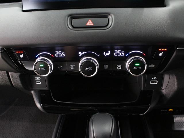 ヴェゼル ｅ：ＨＥＶＺ　弊社デモカー　プレミアムオーディオ　純正９インチコネクト対応ナビ　マルチビューカメラ　サイドカーテンエアバッグ　Ｂｌｕｅｔｏｏｔｈ　ワイヤレス充電器　パワーテールゲート　運転席助手席シートヒーター（51枚目）