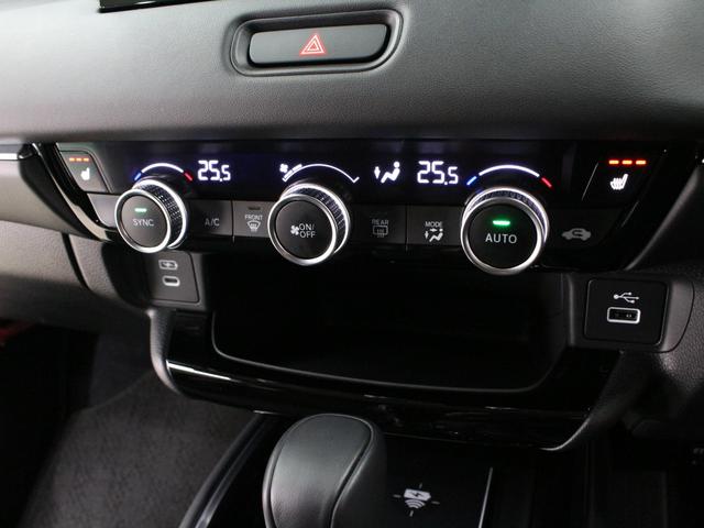 ヴェゼル ｅ：ＨＥＶＺ　弊社デモカー　プレミアムオーディオ　純正９インチコネクト対応ナビ　マルチビューカメラ　サイドカーテンエアバッグ　Ｂｌｕｅｔｏｏｔｈ　ワイヤレス充電器　パワーテールゲート　運転席助手席シートヒーター（52枚目）