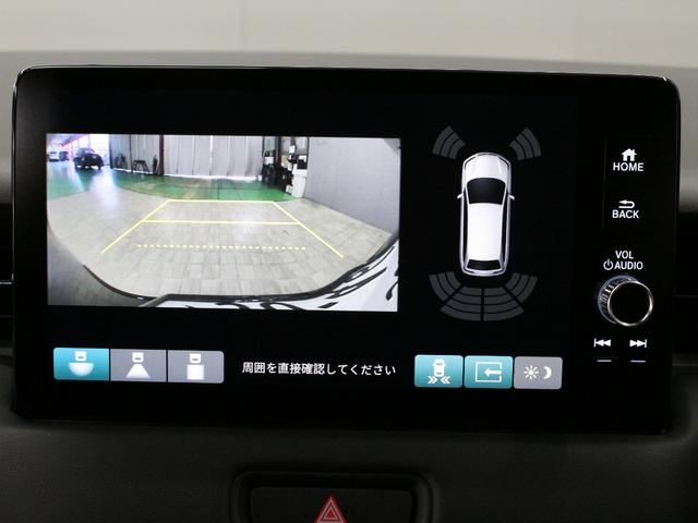 ヴェゼル ｅ：ＨＥＶＺ　ワンオーナー　９インチコネクトナビ　電子制御パーキングブレーキ　シートヒーター　デュアルエアコン　サイドカーテンエアバッグ　Ｂｌｕｅｔｏｏｔｈ　ワイヤレス充電器　ハンズフリーアクセスパワーテールゲート（4枚目）