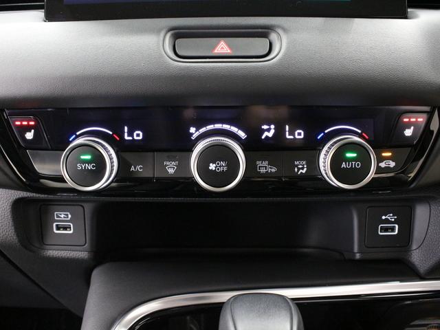 ヴェゼル ｅ：ＨＥＶＺ　ワンオーナー　９インチコネクトナビ　電子制御パーキングブレーキ　シートヒーター　デュアルエアコン　サイドカーテンエアバッグ　Ｂｌｕｅｔｏｏｔｈ　ワイヤレス充電器　ハンズフリーアクセスパワーテールゲート（6枚目）