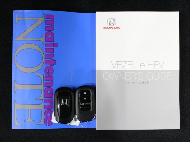 ヴェゼル ｅ：ＨＥＶＺ　ワンオーナー　９インチコネクトナビ　電子制御パーキングブレーキ　シートヒーター　デュアルエアコン　サイドカーテンエアバッグ　Ｂｌｕｅｔｏｏｔｈ　ワイヤレス充電器　ハンズフリーアクセスパワーテールゲート（55枚目）