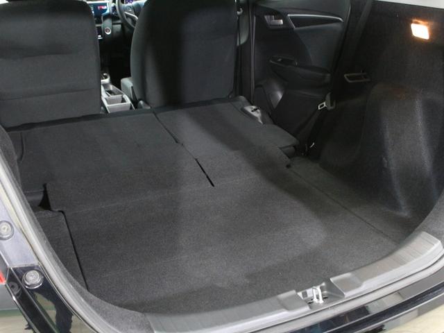 フィット １３Ｇ・Ｆパッケージ　ワンオーナー　禁煙車　純正メモリーナビ　リアカメラ　Ｂｌｕｅｔｏｏｔｈ　ハンドルリモコン　オートエアコン　スマートキー　ＤＶＤ　地デジ　社外アルミ（29枚目）