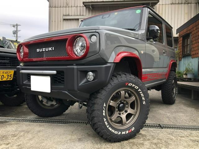 ジムニー ＸＣ　当社デモカー／４ＷＤ／５速マニュアル／３インチリフトアップ／オリジナルマフラー／オリジナルオバフェン／オリジナルツートンカラー／オリジナルシートカバー／スマートキー／ナビ／地デジＴＶ／バックカメラ（3枚目）