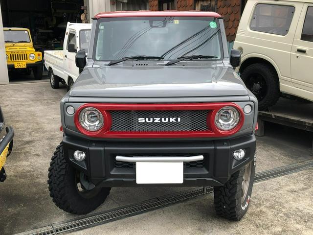 ジムニー ＸＣ　当社デモカー／４ＷＤ／５速マニュアル／３インチリフトアップ／オリジナルマフラー／オリジナルオバフェン／オリジナルツートンカラー／オリジナルシートカバー／スマートキー／ナビ／地デジＴＶ／バックカメラ（4枚目）
