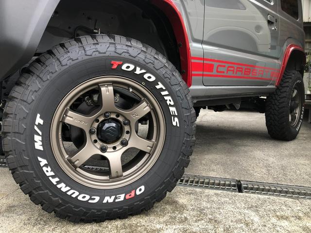 ジムニー ＸＣ　当社デモカー／４ＷＤ／５速マニュアル／３インチリフトアップ／オリジナルマフラー／オリジナルオバフェン／オリジナルツートンカラー／オリジナルシートカバー／スマートキー／ナビ／地デジＴＶ／バックカメラ（6枚目）