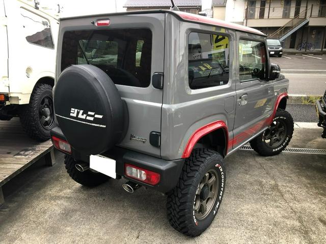 ジムニー ＸＣ　当社デモカー／４ＷＤ／５速マニュアル／３インチリフトアップ／オリジナルマフラー／オリジナルオバフェン／オリジナルツートンカラー／オリジナルシートカバー／スマートキー／ナビ／地デジＴＶ／バックカメラ（9枚目）