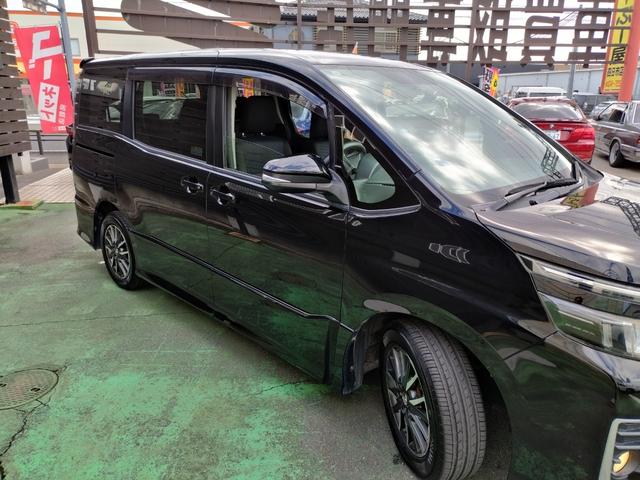 ヴォクシー ZS 1オーナー 走行97852K Tチェーン 両側電動ドア 16アルミ リアスポ LEDヘッド フォグ 7人乗 アイドルストップ 9型ナビTVBモニETCステリモ ドラレコ フリップモニ スマートキ保証付(10枚目)