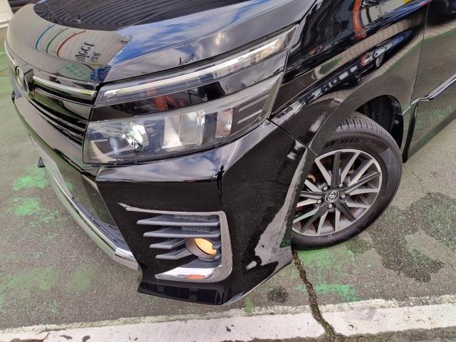 ヴォクシー ZS 1オーナー 走行97852K Tチェーン 両側電動ドア 16アルミ リアスポ LEDヘッド フォグ 7人乗 アイドルストップ 9型ナビTVBモニETCステリモ ドラレコ フリップモニ スマートキ保証付(28枚目)