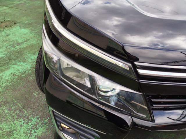 ヴォクシー ZS 1オーナー 走行97852K Tチェーン 両側電動ドア 16アルミ リアスポ LEDヘッド フォグ 7人乗 アイドルストップ 9型ナビTVBモニETCステリモ ドラレコ フリップモニ スマートキ保証付(34枚目)