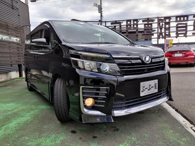 ヴォクシー ZS 1オーナー 走行97852K Tチェーン 両側電動ドア 16アルミ リアスポ LEDヘッド フォグ 7人乗 アイドルストップ 9型ナビTVBモニETCステリモ ドラレコ フリップモニ スマートキ保証付(35枚目)