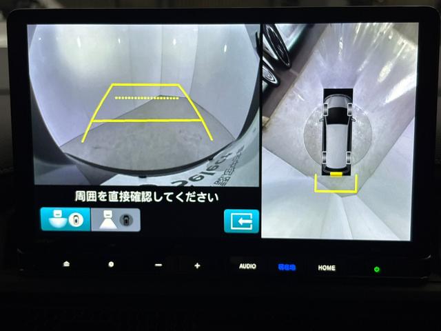 ステップワゴン ｅ：ＨＥＶスパーダ　当社デモカー　セカンドシートオットマン　純正大型フリップダウンモニター　純正メモリーナビ　全周囲カメラ　左右電動スライドドア　電動リアゲート　　左右シートヒーター（22枚目）
