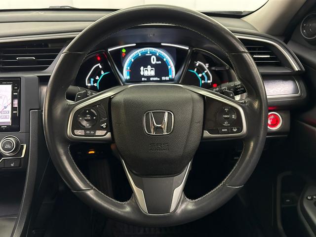 シビック セダン ホンダセンシング搭載車 純正メモリーナビ バックモニター LEDヘッドライト 渋滞追従機能装備 レザーインテリア 電動シート アダプティブクルーズコントロール(14枚目)