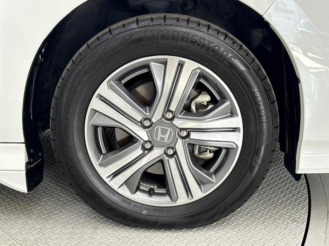 ステップワゴンスパーダ e:HEVスパーダGホンダセンシング 前後純正ドライブレコーダー 純正メモリーナビ 地デジチューナー ミュージックラック Bluetooth対応 バックモニター ETC2.0 純正アルミホイール(10枚目)