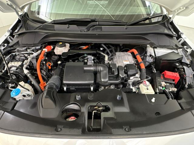 ヴェゼル ｅ：ＨＥＶＺ　純正メモリーナビ　地デジチューナー　ミュージックラック　Ｂｌｕｅｔｏｏｔｈ対応　ワイヤレス充電器　バックモニター　電動リアゲート　純正ドライブレコーダー（12枚目）