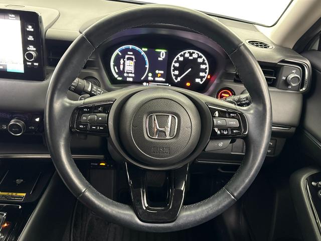 ヴェゼル ｅ：ＨＥＶＺ　純正メモリーナビ　地デジチューナー　ミュージックラック　Ｂｌｕｅｔｏｏｔｈ対応　ワイヤレス充電器　バックモニター　電動リアゲート　純正ドライブレコーダー（14枚目）