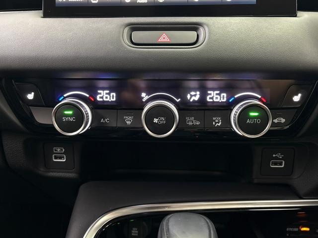 ヴェゼル ｅ：ＨＥＶＺ　純正メモリーナビ　地デジチューナー　ミュージックラック　Ｂｌｕｅｔｏｏｔｈ対応　ワイヤレス充電器　バックモニター　電動リアゲート　純正ドライブレコーダー（27枚目）