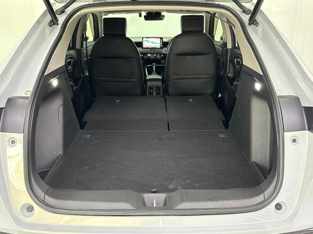 ヴェゼル ｅ：ＨＥＶＺ　純正メモリーナビ　地デジチューナー　ミュージックラック　Ｂｌｕｅｔｏｏｔｈ対応　ワイヤレス充電器　バックモニター　電動リアゲート　純正ドライブレコーダー（32枚目）