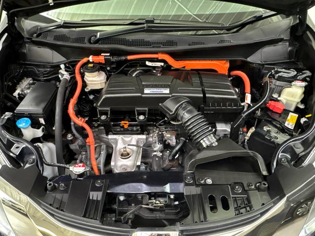 オデッセイハイブリッド ハイブリッドアブソルート・ホンダセンシンアドバンスP 純正メモリーナビ 地デジチューナー Bluetooth対応 マルチビューカメラシステム パーキングアシスト機能付き 左右電動スライドドア セカンドオットマン ETC 電動シート USB接続ジャック(12枚目)