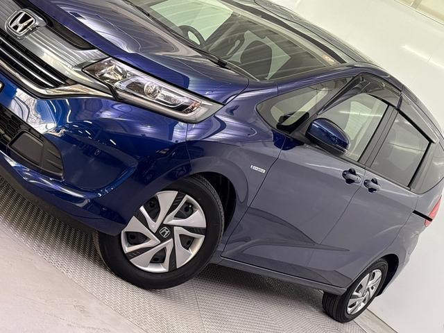 フリードハイブリッド ハイブリッド・Gホンダセンシング 純正メモリーナビ バックモニター ワンセグチューナー Bluetooth対応 左右電動スライドドア ETC 社外ドライブレコーダー(3枚目)