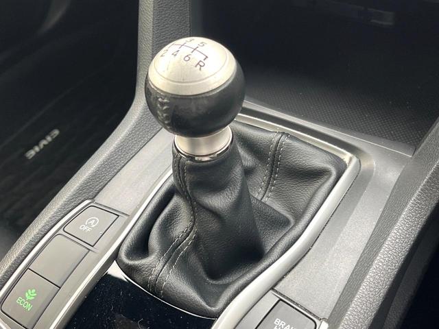 シビック ハッチバック 後期 6MT 禁煙車 ホンダセンシング 純正18インチアルミ LEDヘッド アダプティブクルーズコントロール シートヒーター 純正SDナビ バックカメラ スポーツペダル パワーシート ワンオーナー(3枚目)