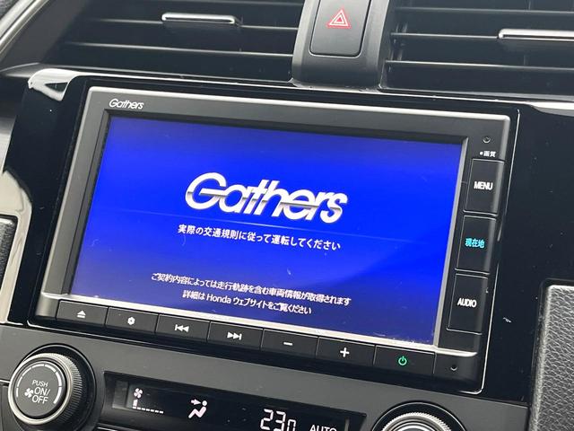 シビック ハッチバック 後期 6MT 禁煙車 ホンダセンシング 純正18インチアルミ LEDヘッド アダプティブクルーズコントロール シートヒーター 純正SDナビ バックカメラ スポーツペダル パワーシート ワンオーナー(4枚目)