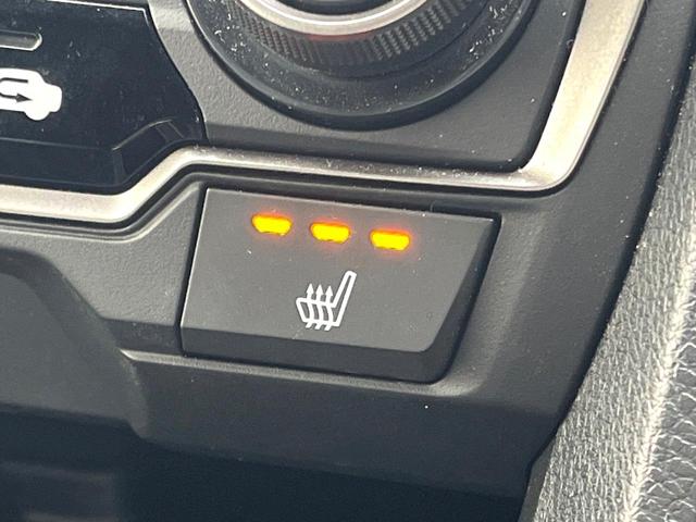 シビック ハッチバック 後期 6MT 禁煙車 ホンダセンシング 純正18インチアルミ LEDヘッド アダプティブクルーズコントロール シートヒーター 純正SDナビ バックカメラ スポーツペダル パワーシート ワンオーナー(7枚目)