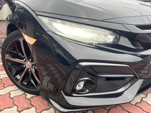 シビック ハッチバック 後期 6MT 禁煙車 ホンダセンシング 純正18インチアルミ LEDヘッド アダプティブクルーズコントロール シートヒーター 純正SDナビ バックカメラ スポーツペダル パワーシート ワンオーナー(12枚目)