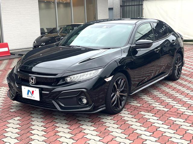 シビック ハッチバック 後期 6MT 禁煙車 ホンダセンシング 純正18インチアルミ LEDヘッド アダプティブクルーズコントロール シートヒーター 純正SDナビ バックカメラ スポーツペダル パワーシート ワンオーナー(21枚目)