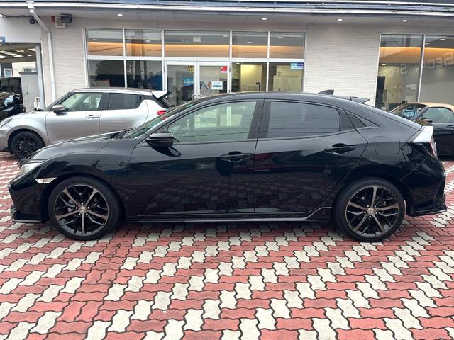 シビック ハッチバック 後期 6MT 禁煙車 ホンダセンシング 純正18インチアルミ LEDヘッド アダプティブクルーズコントロール シートヒーター 純正SDナビ バックカメラ スポーツペダル パワーシート ワンオーナー(22枚目)