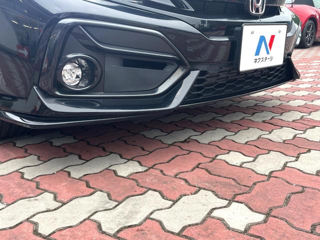 シビック ハッチバック 後期 6MT 禁煙車 ホンダセンシング 純正18インチアルミ LEDヘッド アダプティブクルーズコントロール シートヒーター 純正SDナビ バックカメラ スポーツペダル パワーシート ワンオーナー(25枚目)