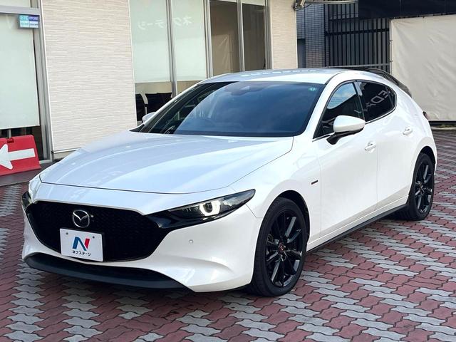 ＭＡＺＤＡ３ファストバック １５Ｓ　１００周年特別記念車　６ＭＴ　禁煙車　ＢＯＳＥサウンド　全周囲カメラ　赤革　シートヒーター　パワーシート　クルージングトラフィックサポート　アダプティブＬＥＤヘッド　革巻きステアリング　ステアリングヒーター　専用ボディ色（26枚目）