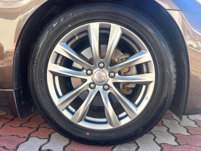 フーガ ２５０ＶＩＰ　後期　ＢＯＳＥサラウンドサウンド　ベージュ革　ベージュ革調ドアアームレスト　禁煙車　全席シートヒーター　全席パワーシート　電動サンシェード　全周囲　メーカーナビ　純正１８インチＡＷ　ＬＥＤヘッド（29枚目）