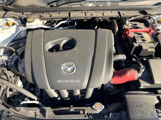 MAZDA3ファストバック 20S 100周年特別記念車 6MT 純正エアロ(F/S) XYZ車高調 禁煙車 BOSEサウンド 全周囲カメラ カラーHUD スマートブレーキサポート BSM レークル 赤革 シートヒーター 純正18インチAW LEDヘッド(18枚目)