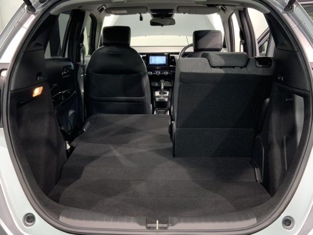フィット e:HEVホーム 1年保証 禁煙 法人ワンオーナー ホンダセンシング 純正7インチメモリーナビ(VXM-205Ci) リアカメラ ETC LEDヘッドライト 純正ドライブレコーダ サイドカーテンエアバッグ ドアバイザー(39枚目)