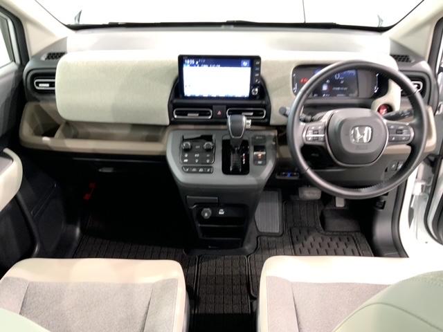 フリード エアーＥＸ　当社試乗車　禁煙　新車保証継承　９インチナビＬＸＭ－２４２ＺＦＮｉ　Ｒカメラ　Ｂｌｕｅｔｏｏｔｈリアクーラー　ブラインドスポットインフォメーション　１５インチアルミ　フロアカーペット　ＥＴＣ車載器（9枚目）
