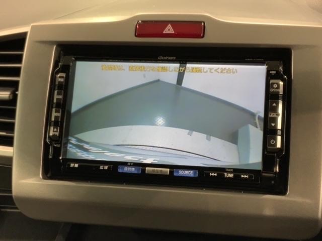 フリード Ｇ　１年保証　禁煙　福祉車両　助手席リフトアップシート　ナビ　Ｒカメラ　ＣＤ　ＤＶＤ　ワンセグＴＶ　片側電動スライドドア　ドアバイザー　フロアカーペット　ＥＴＣ車載器（5枚目）