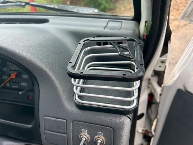 サンバートラック  エアコン 社外アルミホイール12インチ 4WD 平床ボディ 三方開 社外オーディオ CD メーカーオプションフロントメッキバイザー メッキドアミラー 5MT 下廻りシャーシブラック塗装済み(41枚目)