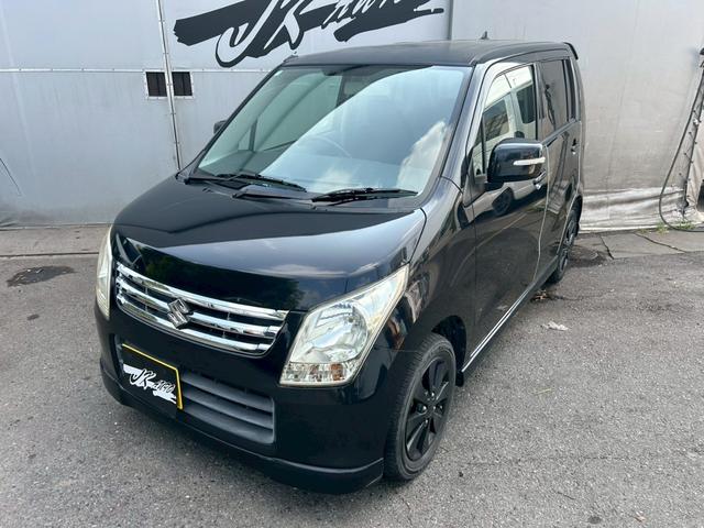 ワゴンR FXリミテッドII エアコン パワステ パワーウィンドウ 運転席・助手席エアバッグ ABS ETC 純正アルミホイール14インチ スマートキー 電動格納ミラー ベンチシート 社外メモリーナビ CD ワンセグTV(7枚目)