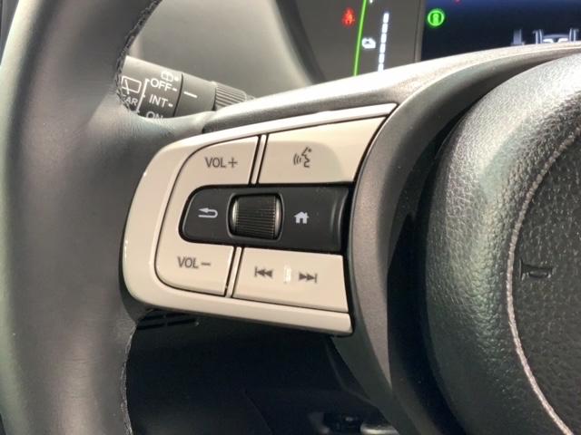 フィット e:HEVホーム H SENSING 新車保証 試乗車 ワンオーナー ナビVXU-245FTi TV Rカメラ CD録音 BTオ-ディオDVD ETC LEDライト VSA クルコン スマ-トキ- 盗難防止装置 AAC(10枚目)