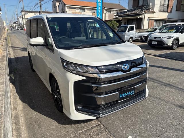 ノア ハイブリッドS-Z バックカメラ スマートキー 快適利便パッケージ 安心降車アシスト シートヒーター スペアタイヤ ユニバーサルステップ(助手席側) TV(フルセグ)+CD・DVDデッキ ETC2.0ユニット(6枚目)