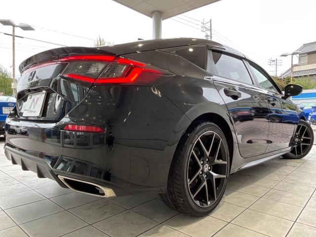 シビック ＥＸ　禁煙車　ＢＯＳＥ　ホンダセンシング　１０．２インチデジタルメーター　ホンダコネクトディスプレイ　バックカメラ　シートヒーター　ドラレコ　ＥＴＣ２．０　置くだけ充電　ハーフレザー　純正１８インチアルミ（31枚目）