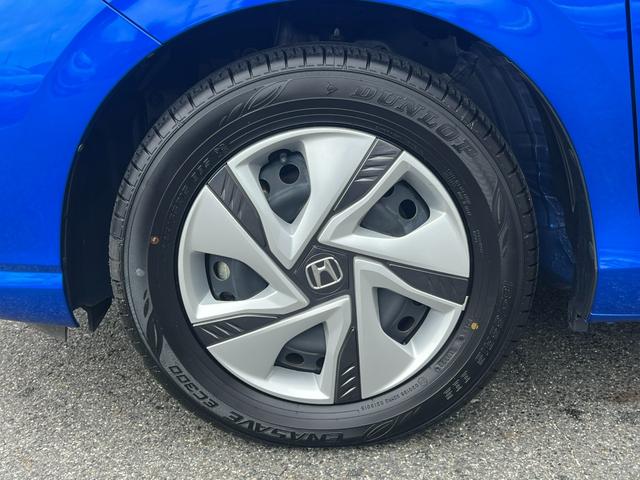 フリードハイブリッド ハイブリッド・Ｇ　ギャザズナビ／センシング／シートヒーター／禁煙車／６人乗／ドアバイザー／ＥＴＣ２．０／パーキングセンサー／両側電動／オートリトラミラー／ＬＥＤヘッドライト／オートエアコン／ロールサンシェイド／（30枚目）