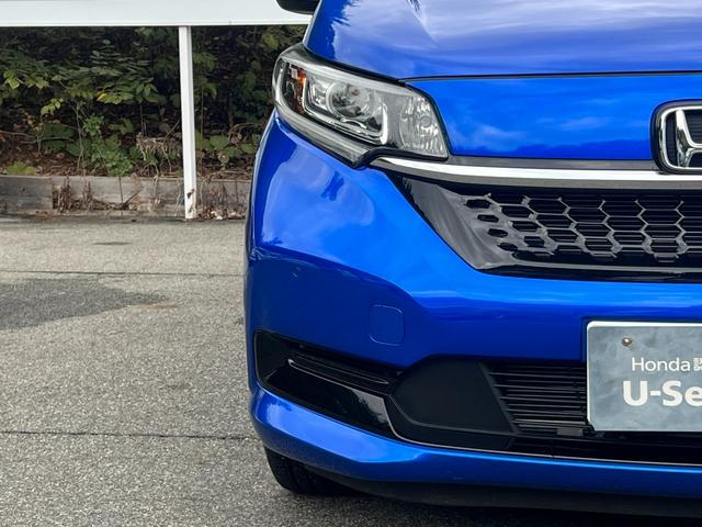 フリードハイブリッド ハイブリッド・Ｇ　ギャザズナビ／センシング／シートヒーター／禁煙車／６人乗／ドアバイザー／ＥＴＣ２．０／パーキングセンサー／両側電動／オートリトラミラー／ＬＥＤヘッドライト／オートエアコン／ロールサンシェイド／（32枚目）