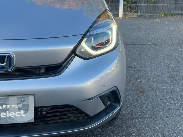 フィット ｅ：ＨＥＶベーシック　社外ナビ／ホンダセンシング／スマートキー／禁煙車／ＥＴＣ／リアカメラ／電子パーキング／ブレーキホールド／パーキングセンサー／サイドエアバック／誤発信抑制機能／保証書／（30枚目）