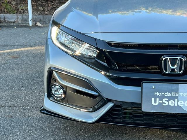 シビック ハッチバック　ギャザズナビ／センシング／シートヒーター／禁煙車／運転席助手席パワーシート／コンビシート／ブラインドスポット／純正１８ＡＷ／ＬＥＤヘッドライト／オートリトラミラー／電子パーキング／スマートキー（34枚目）