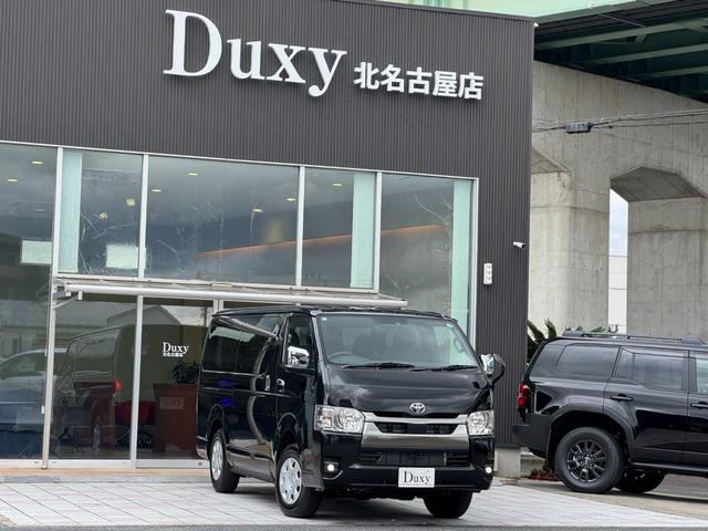 ハイエースバン ロングスーパーGL ダークプライムS 4WD 純正7インチナビ パノラミックビューモニター デジタルインナーミラー 寒冷地仕様 ETC 黒ハーフレザーシート 両側パワースライドドア 純正15インチスチールホイール LEDヘッドライト(5枚目)