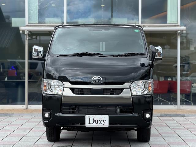 ハイエースバン ロングスーパーGL ダークプライムS 4WD 純正7インチナビ パノラミックビューモニター デジタルインナーミラー 寒冷地仕様 ETC 黒ハーフレザーシート 両側パワースライドドア 純正15インチスチールホイール LEDヘッドライト(9枚目)