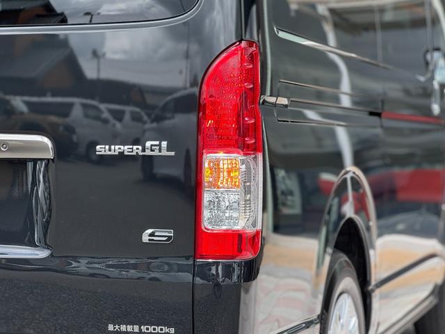 ハイエースバン ロングスーパーGL ダークプライムS 4WD 純正7インチナビ パノラミックビューモニター デジタルインナーミラー 寒冷地仕様 ETC 黒ハーフレザーシート 両側パワースライドドア 純正15インチスチールホイール LEDヘッドライト(38枚目)