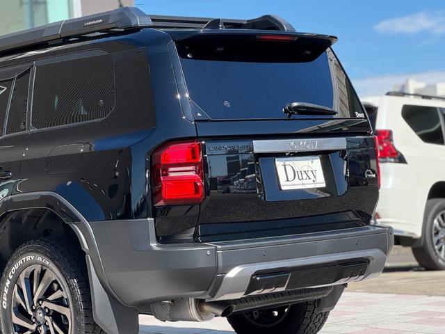 ランドクルーザー250 VX 丸目LLEDヘッドライト モデリスタパッケージ シグネチャーイルミ オーバーフェンダー 20インチAW ルーフラック デジタルインナーミラー ムーンルーフ パノラマビュー ブラインドスポットモニター(40枚目)